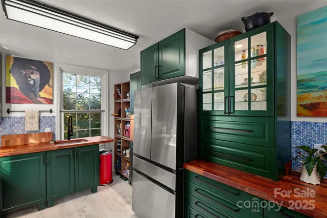 a view of a refrigerator in the kitchen