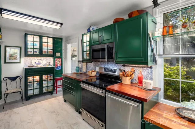 a room with furniture and a flat screen tv