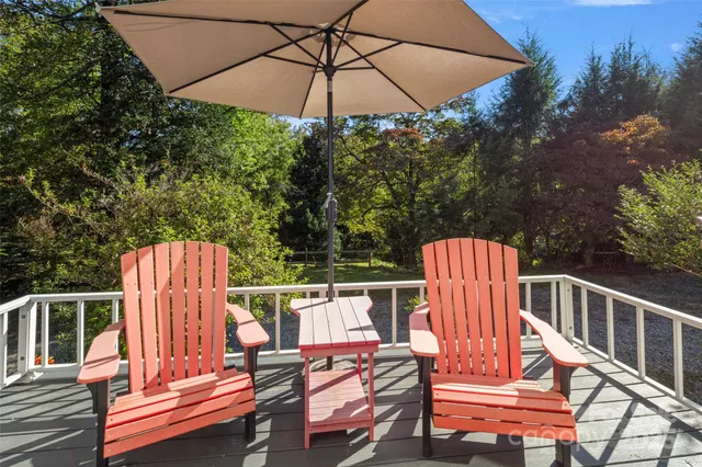 a view of a house that has a small yard