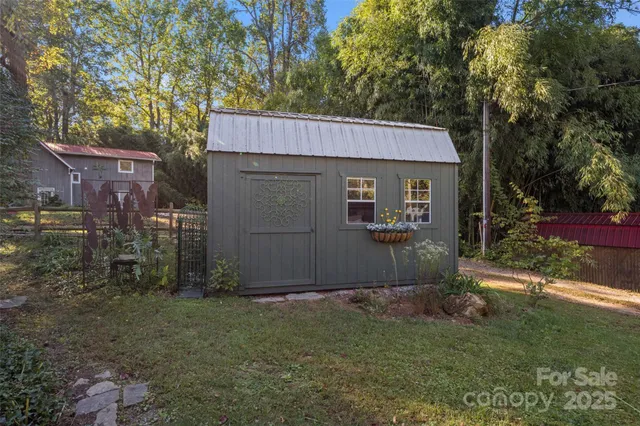 a flower plants in front of a house