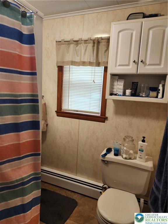 1795 Canal Street, Unit R Northampton, PA 18067 - Photo 11 of 15 a bathroom with a toilet and a sink