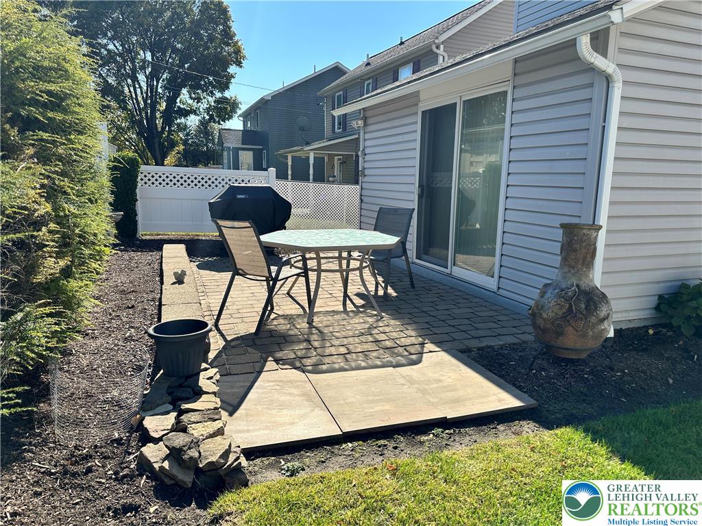 1795 Canal Street, Unit R Northampton, PA 18067 - Photo 5 of 15 a view of a yard with furniture