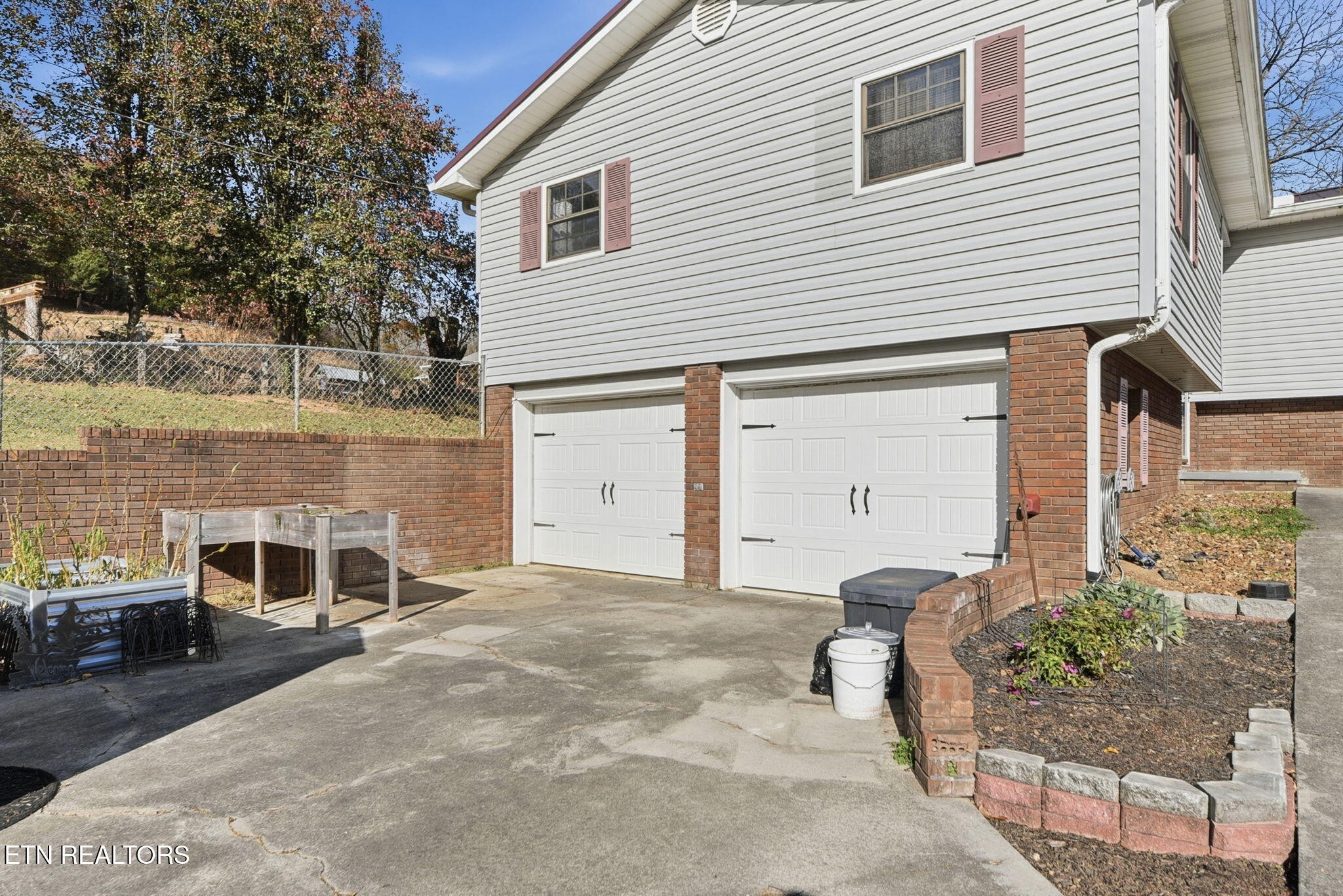148 Batley Loop Road Clinton, TN 37716 - Photo 29 of 30 a front view of a house with a yard