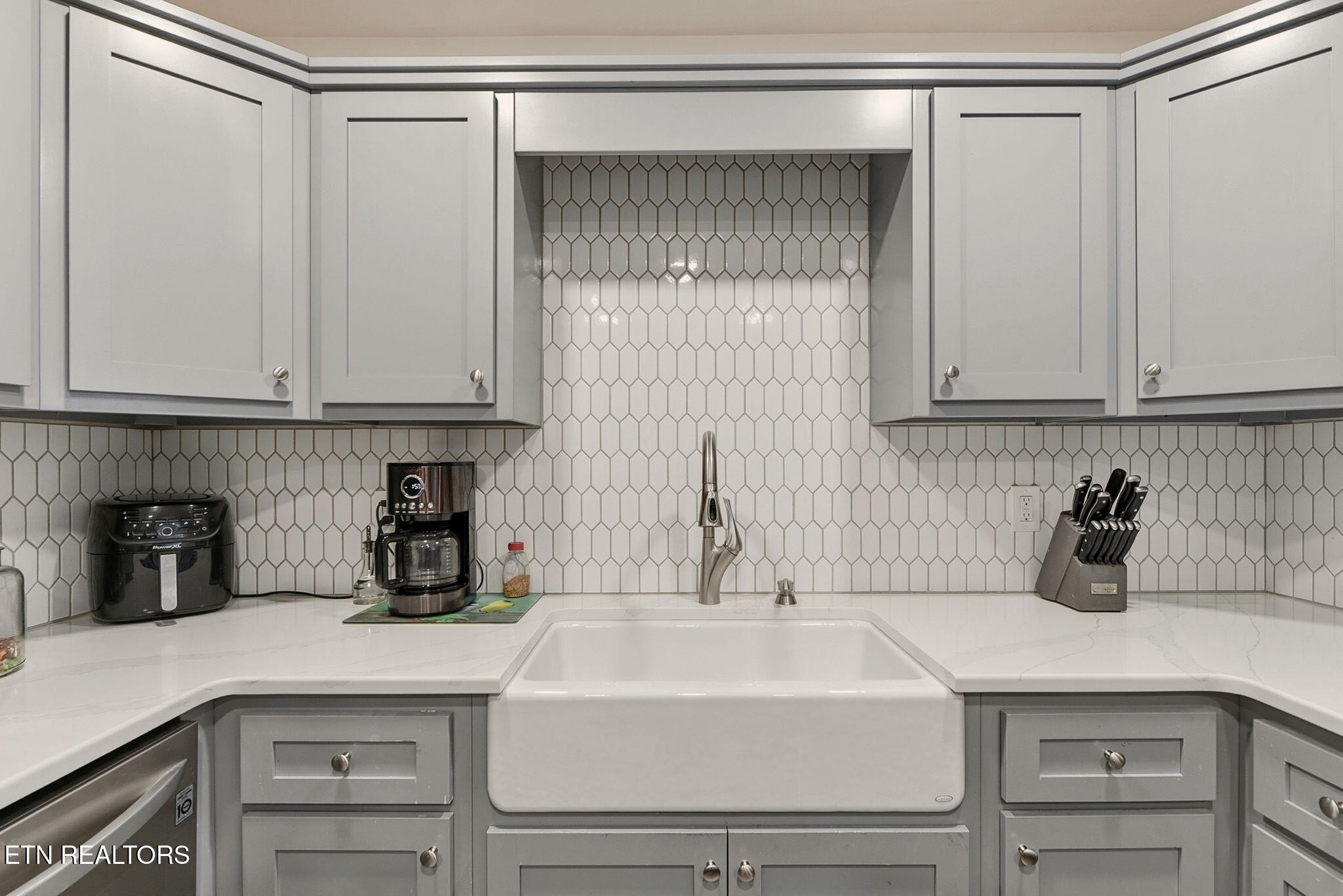148 Batley Loop Road Clinton, TN 37716 - Photo 9 of 30 a kitchen with a sink and cabinets