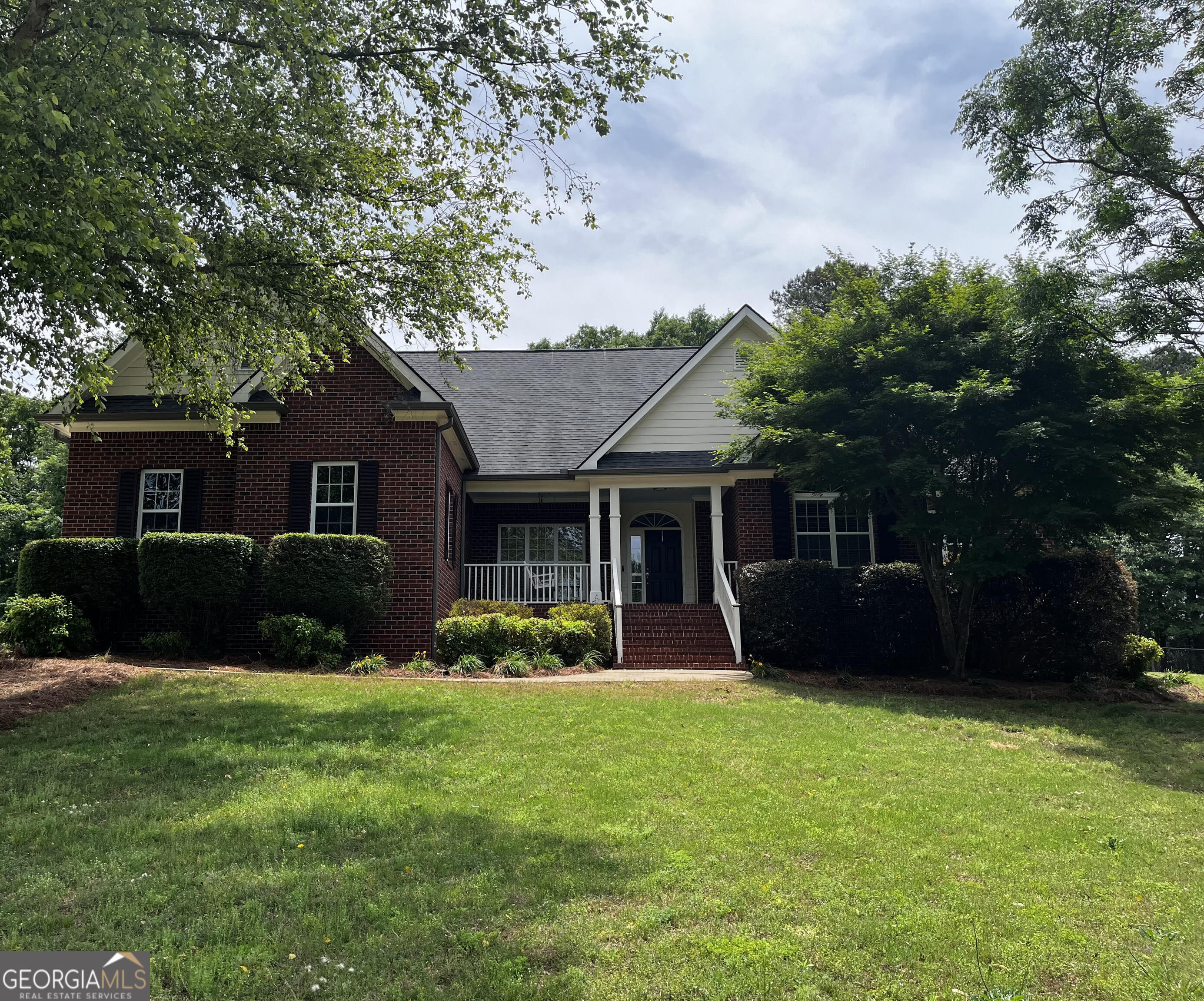779 Appian Way Statham, GA 30666 - Photo 1 of 29 front view of a house with a yard
