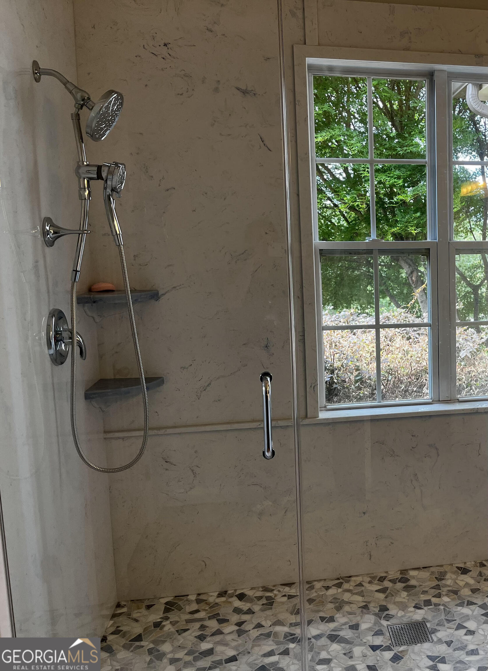 779 Appian Way Statham, GA 30666 - Photo 14 of 29 a bathroom with a shower