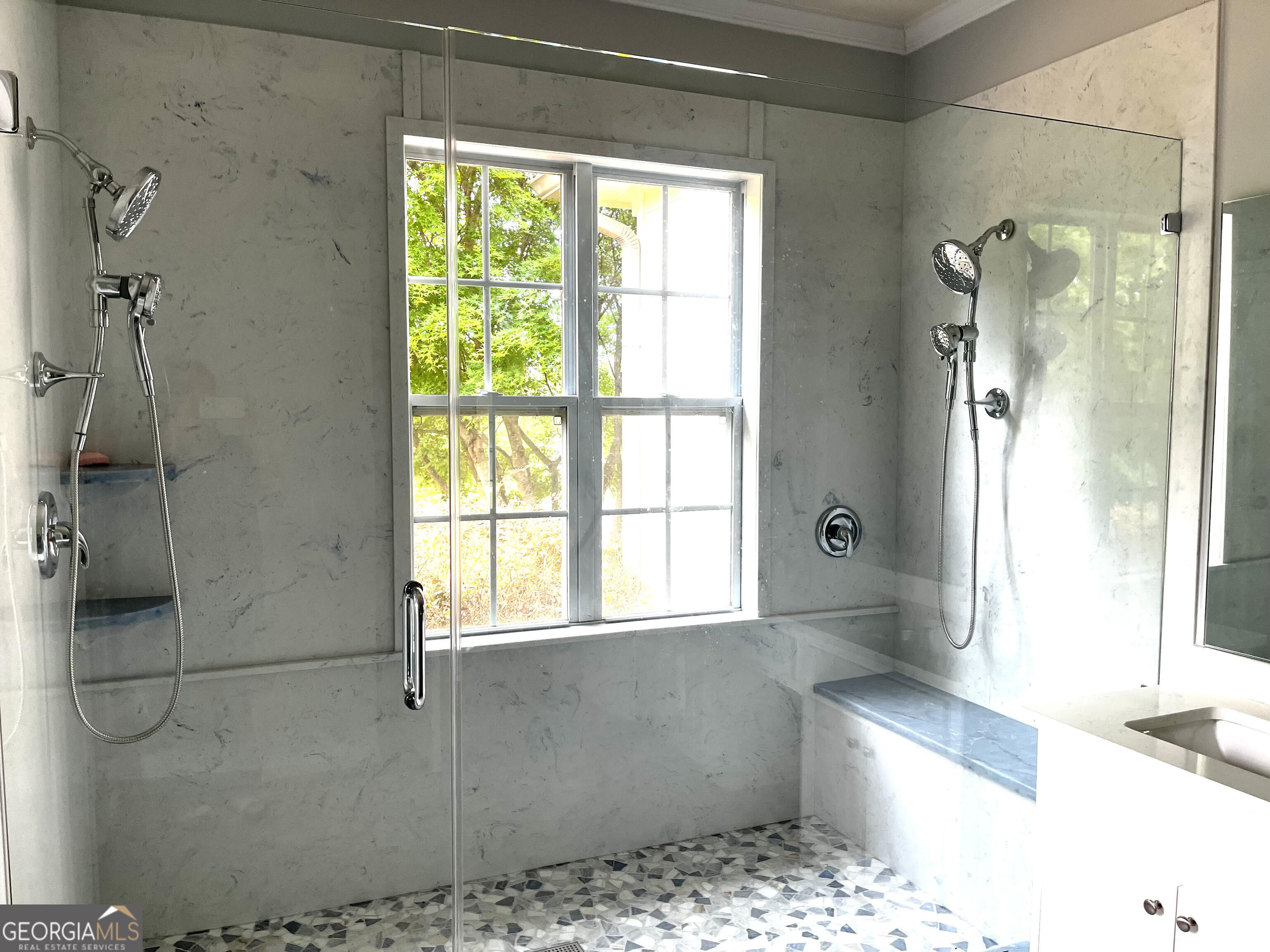 779 Appian Way Statham, GA 30666 - Photo 15 of 29 a bathroom with a bathtub and a shower