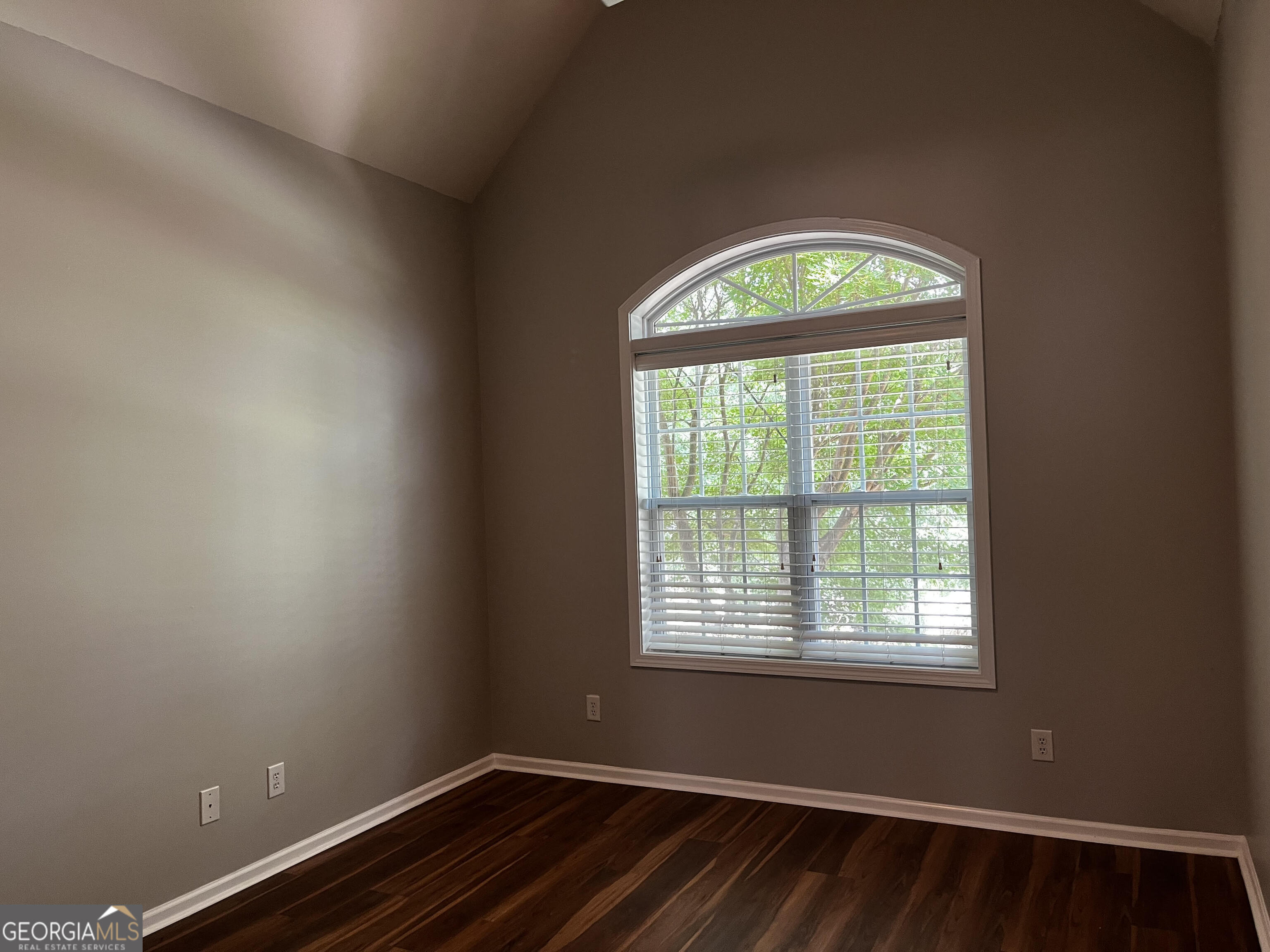 779 Appian Way Statham, GA 30666 - Photo 17 of 29 a view of an empty room with a window