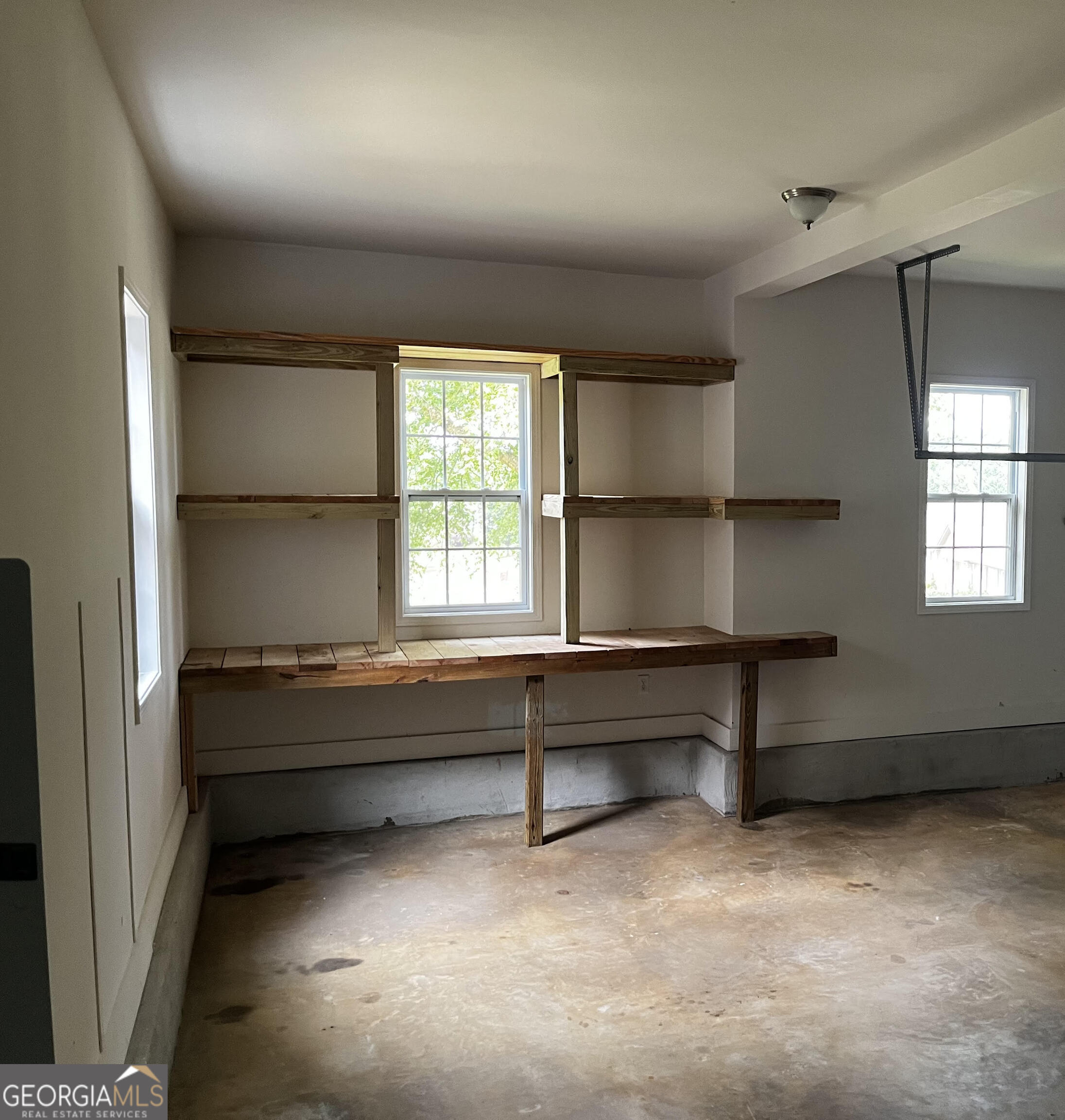779 Appian Way Statham, GA 30666 - Photo 22 of 29 a living room with a window