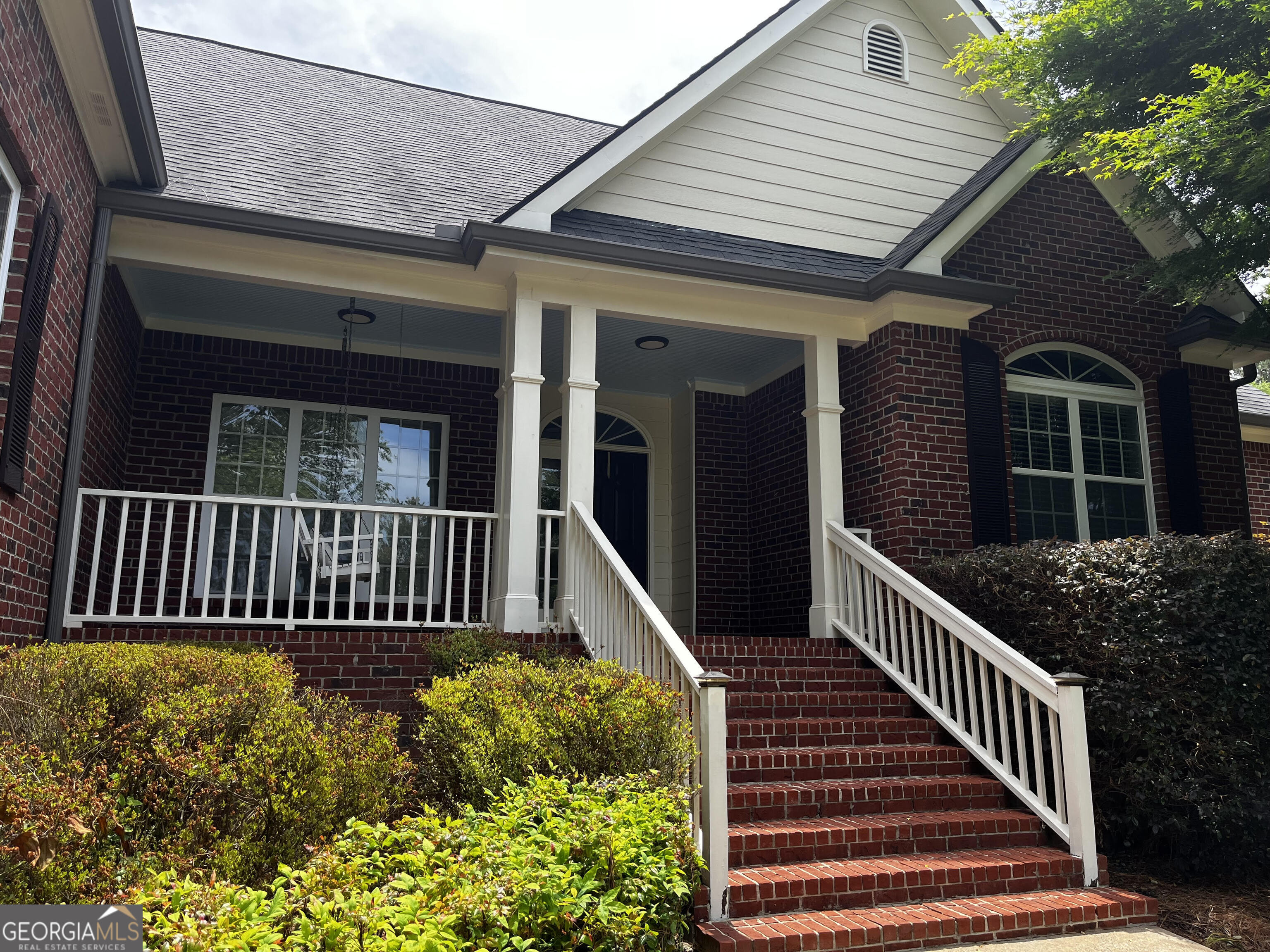 779 Appian Way Statham, GA 30666 - Photo 4 of 29 a view of a house with deck and wooden floor