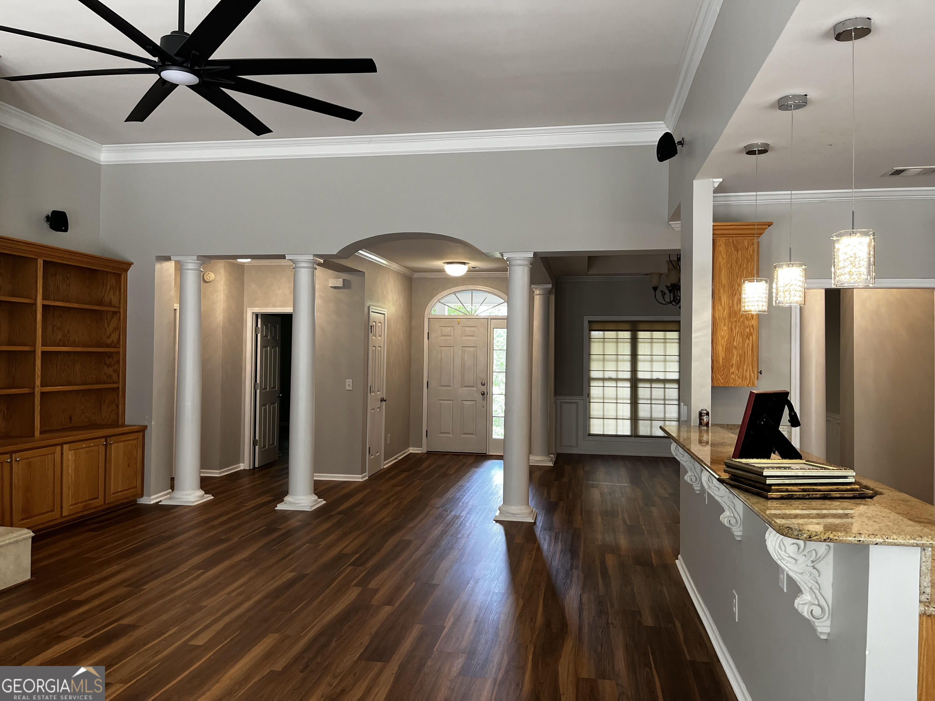 779 Appian Way Statham, GA 30666 - Photo 8 of 29 a open kitchen with stainless steel appliances granite countertop a refrigerator a stove and a wooden floors