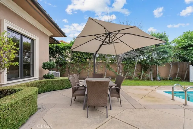 a bedroom with a bed and a television