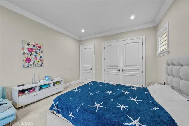 a bathroom with a sink double vanity and a mirror