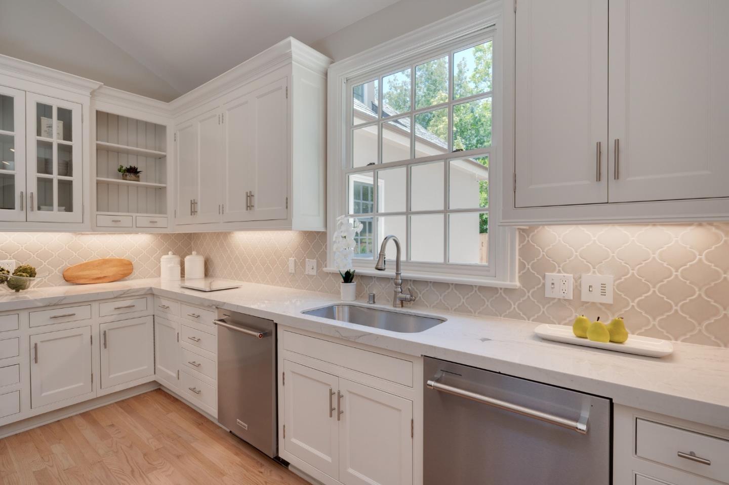 1230 Avondale Road Hillsborough, CA 94010 - Photo 17 of 73 a kitchen with a sink cabinets and window