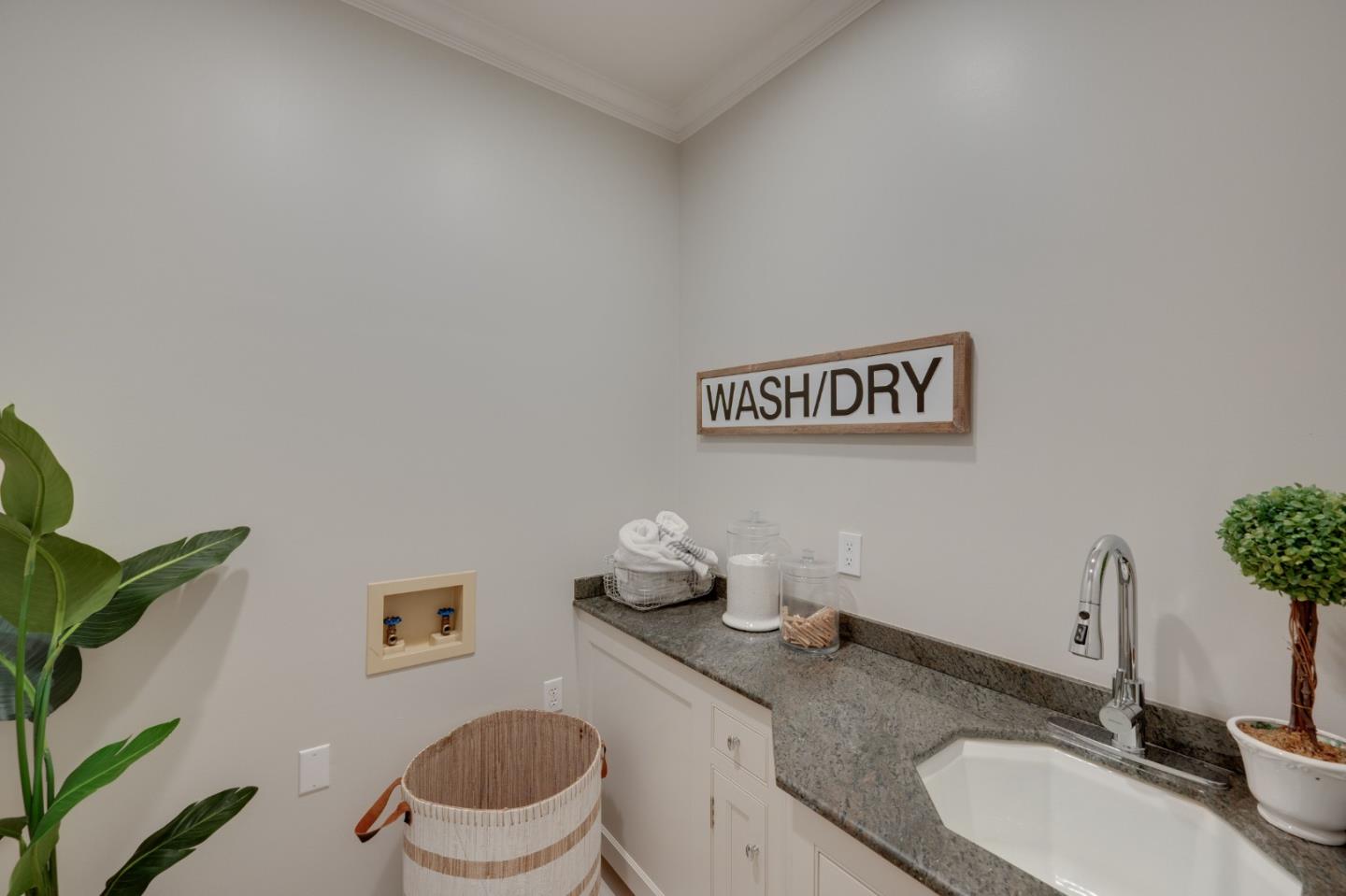 1230 Avondale Road Hillsborough, CA 94010 - Photo 38 of 73 a bathroom with a granite countertop sink and a mirror