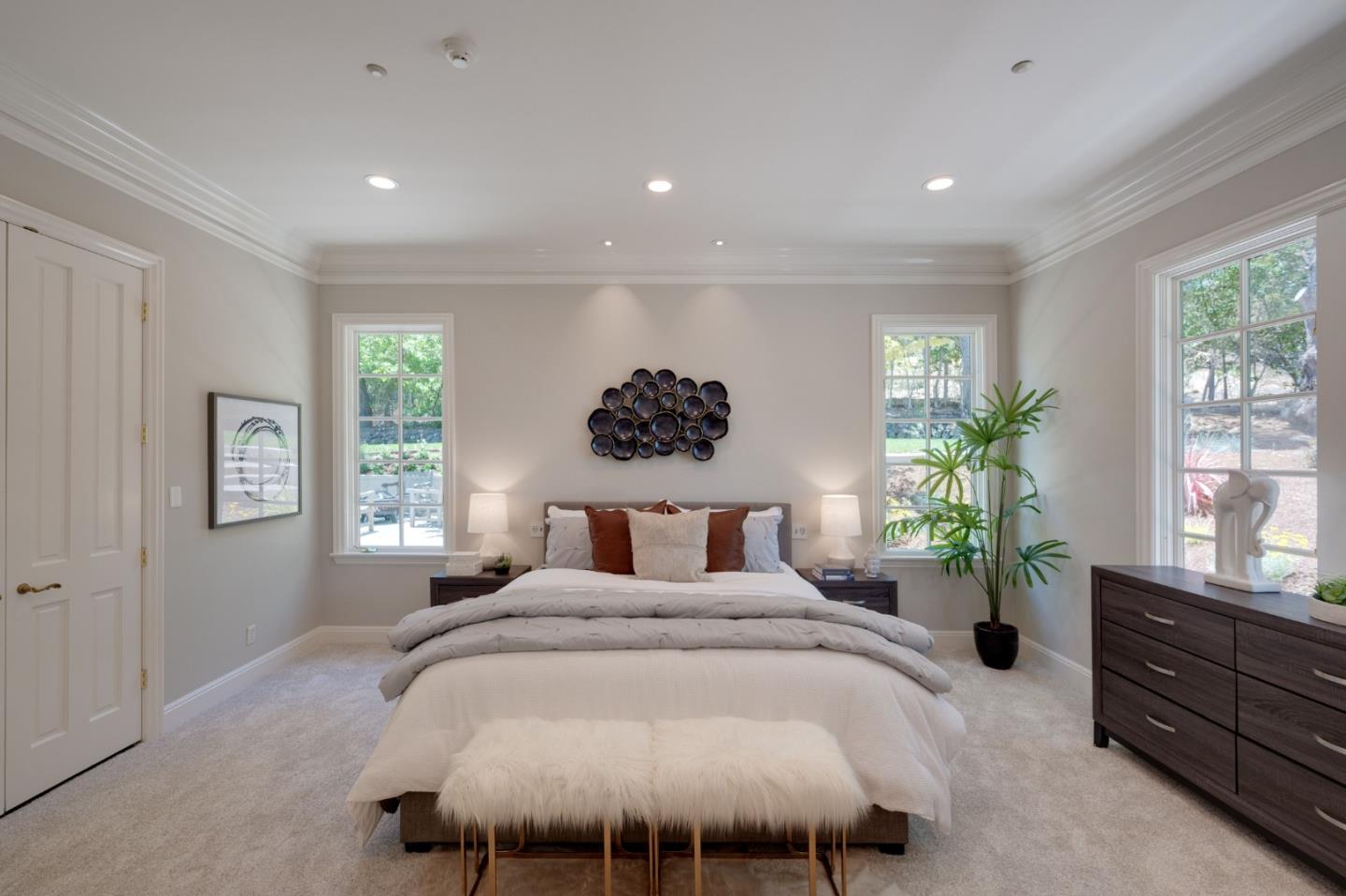 1230 Avondale Road Hillsborough, CA 94010 - Photo 42 of 73 a bed room with a bed window and a potted plant