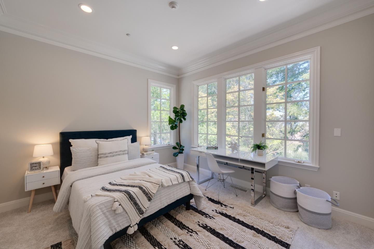 1230 Avondale Road Hillsborough, CA 94010 - Photo 48 of 73 a spacious bedroom with a bed and a large window