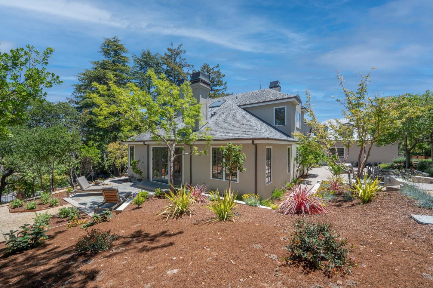1230 Avondale Road Hillsborough, CA 94010 - Photo 60 of 73 a view of a house with a yard and sitting area
