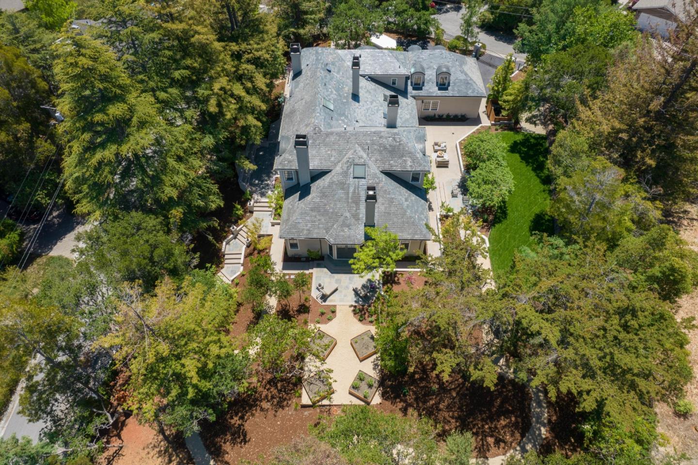 1230 Avondale Road Hillsborough, CA 94010 - Photo 72 of 73 an aerial view of a house with a yard and large trees