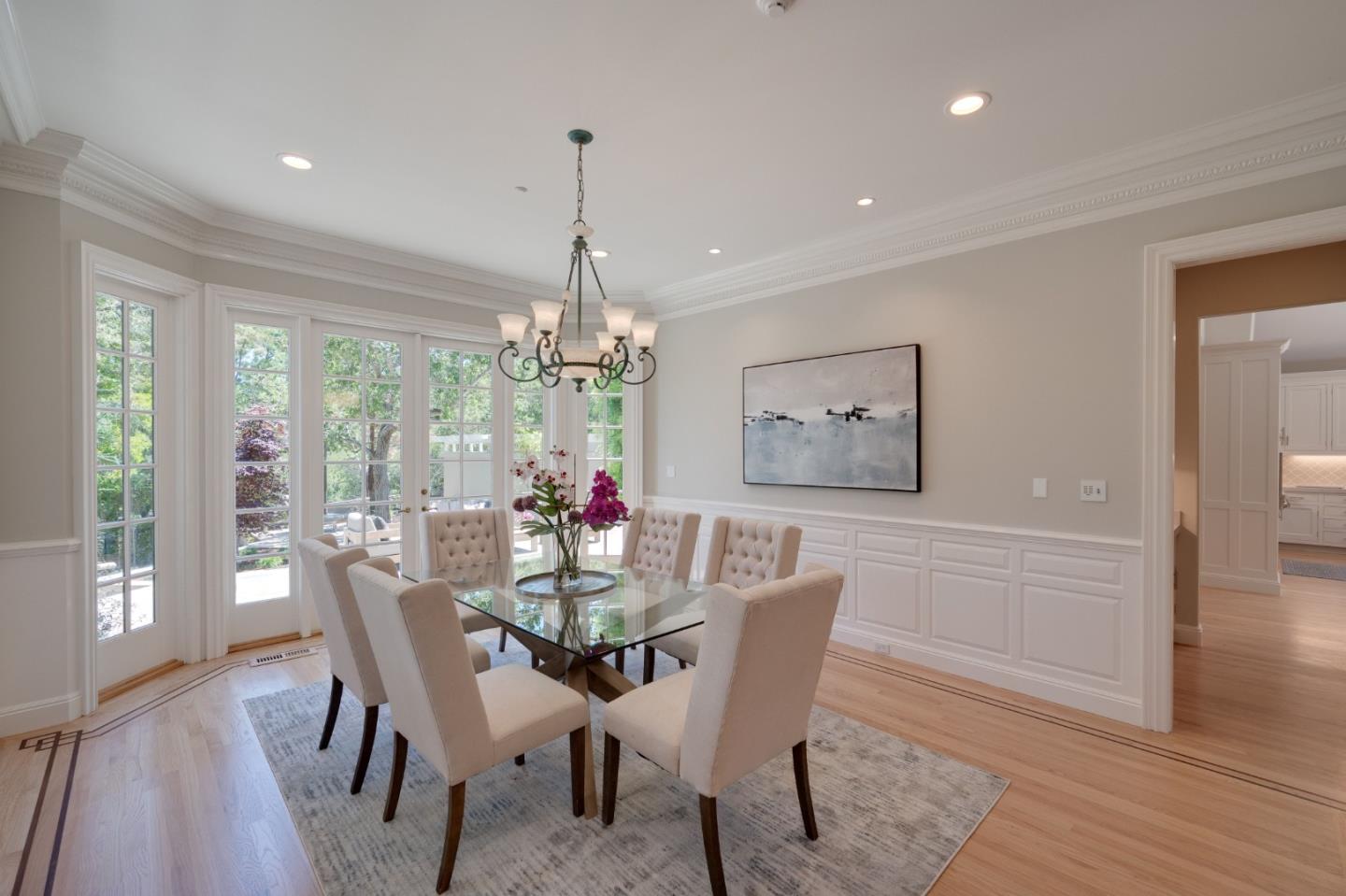 1230 Avondale Road Hillsborough, CA 94010 - Photo 9 of 73 a dining room with furniture a chandelier and wooden floor
