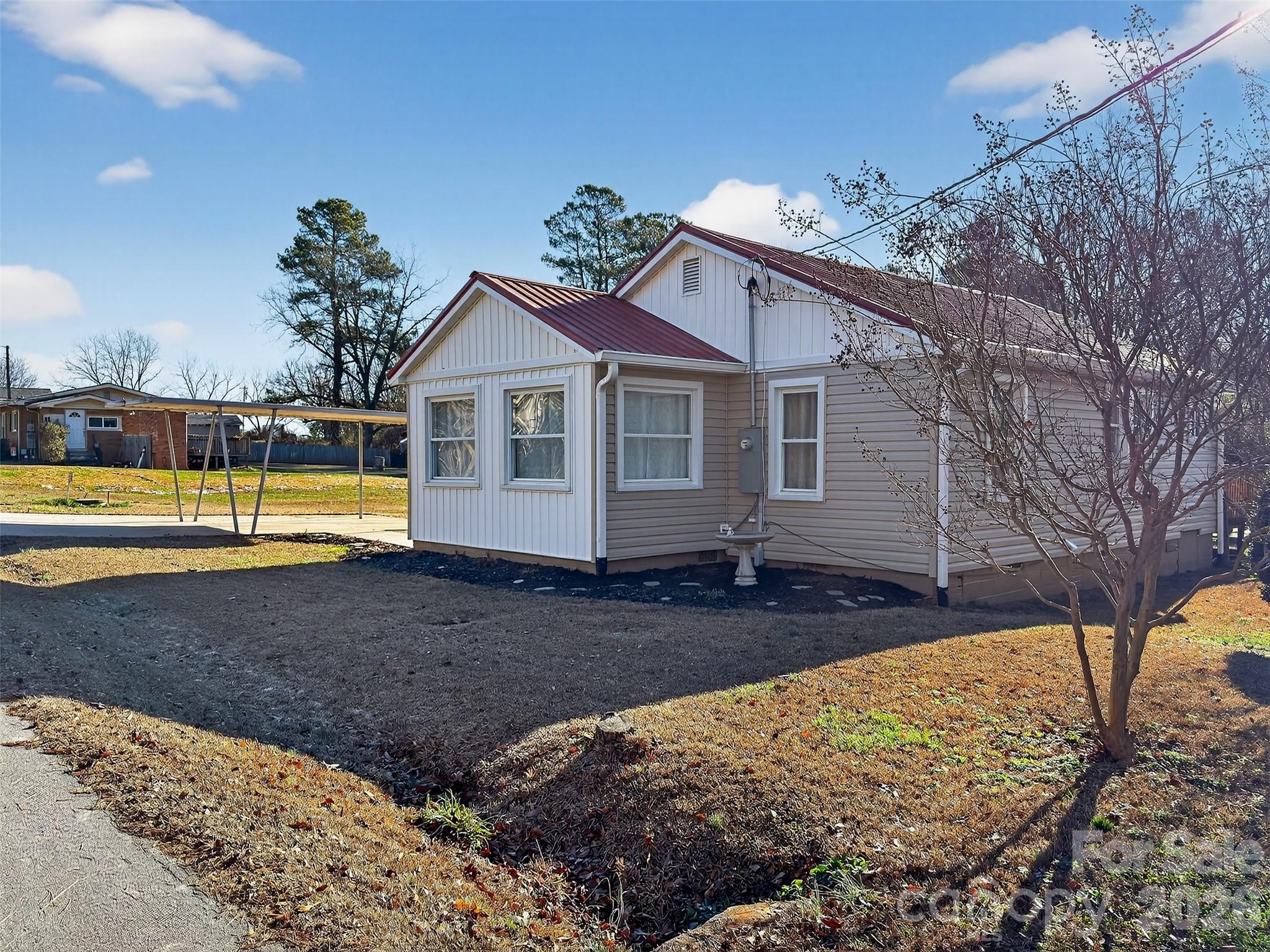 161 Walker Lake Road Forest City, NC 28043 - Photo 20 of 21 a view of a house with a yard covered in snow