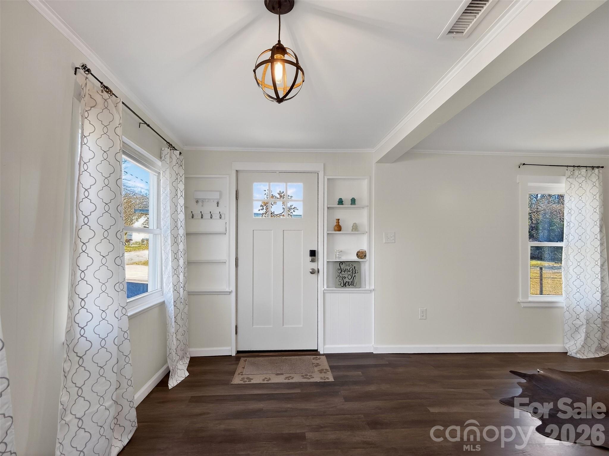 161 Walker Lake Road Forest City, NC 28043 - Photo 10 of 21 a view of an empty room with wooden floor and a window