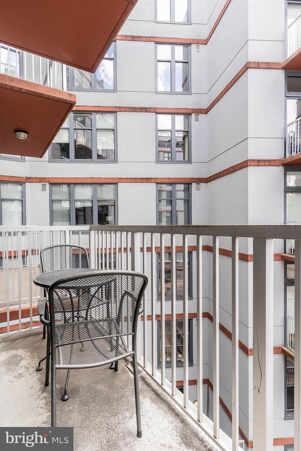 2120 Vermont Avenue Northwest, Unit 312 Washington, DC 20001 - Photo 15 of 16 a view of a building from a roof deck