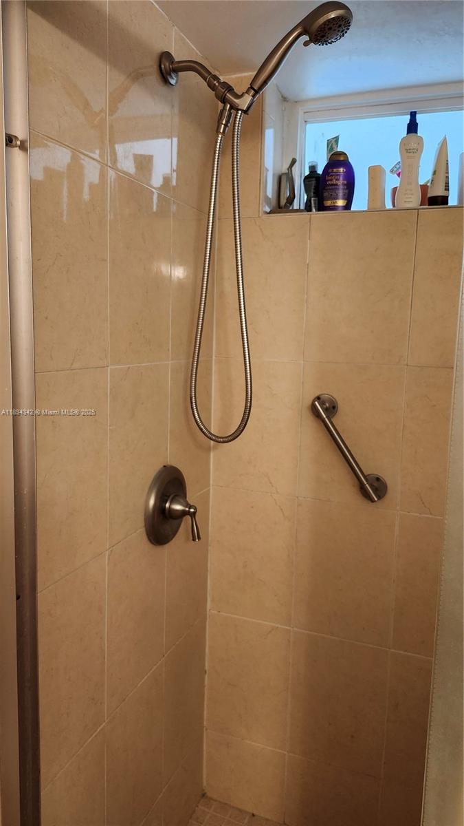 20 Southeast 13th Street, Unit C4 Boca Raton, FL 33432 - Photo 10 of 35 a bathroom with a shower