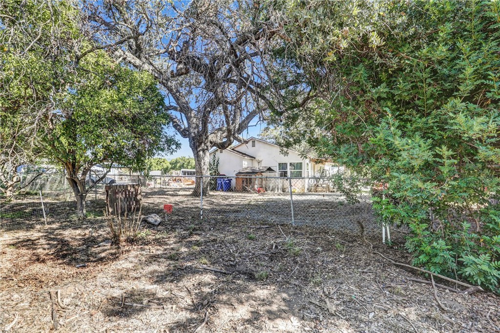 31030 Valley Center Road Valley Center, CA 92082 - Photo 16 of 20 a view of a house with a yard