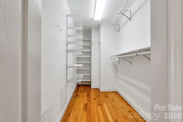 a view of storage and utility room with washer and dryer
