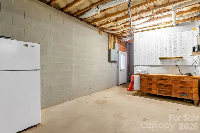a view of a bathroom from a hallway