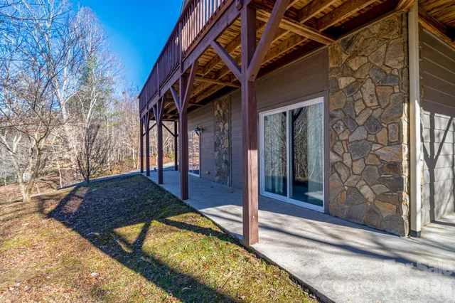 a view of a yard with trees