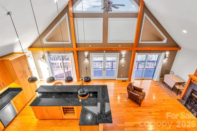 a view of a living room with a large window