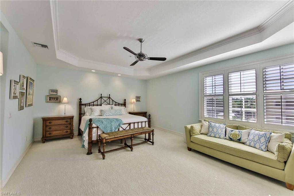 600 5th Avenue South, Unit A212 Naples, FL 34102 - Photo 12 of 21 a living room with furniture and a large window