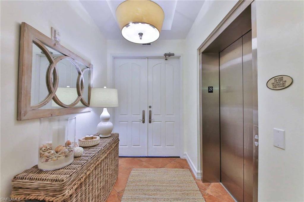 600 5th Avenue South, Unit A212 Naples, FL 34102 - Photo 20 of 21 a bathroom with a sink and a mirror