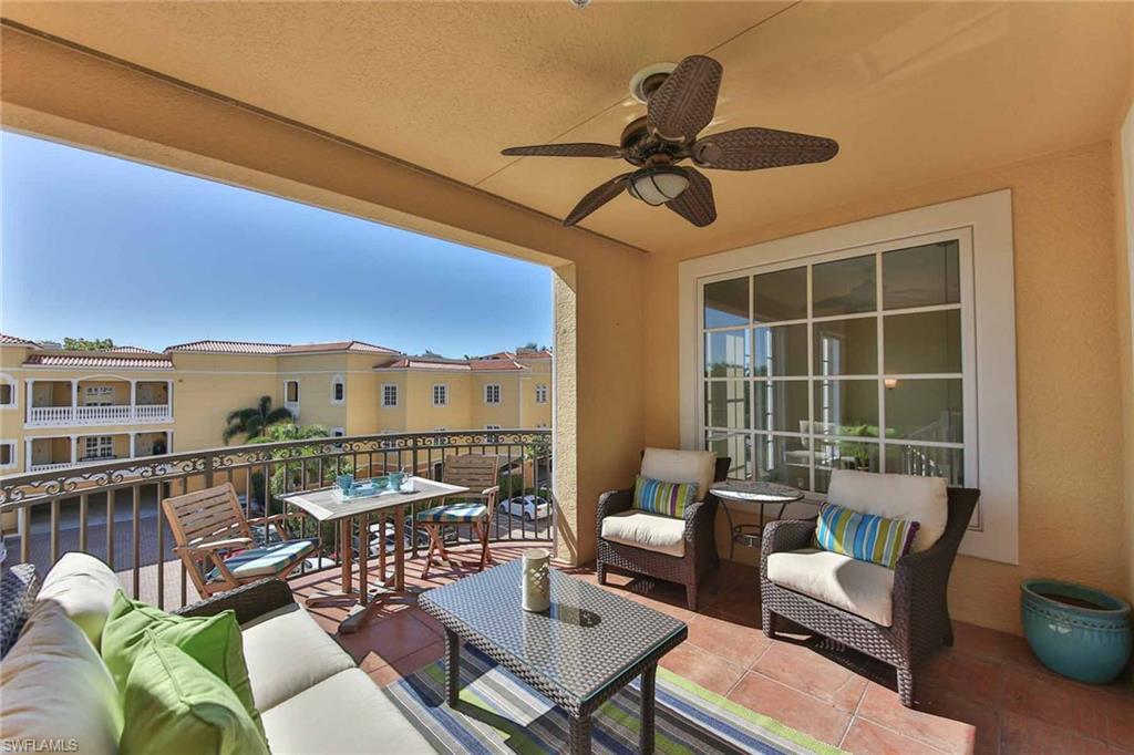 600 5th Avenue South, Unit A212 Naples, FL 34102 - Photo 9 of 21 a view of a balcony with furniture