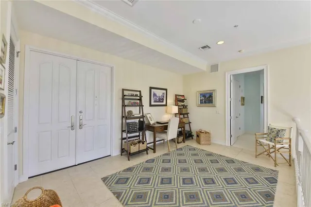a view of a livingroom with furniture and a window