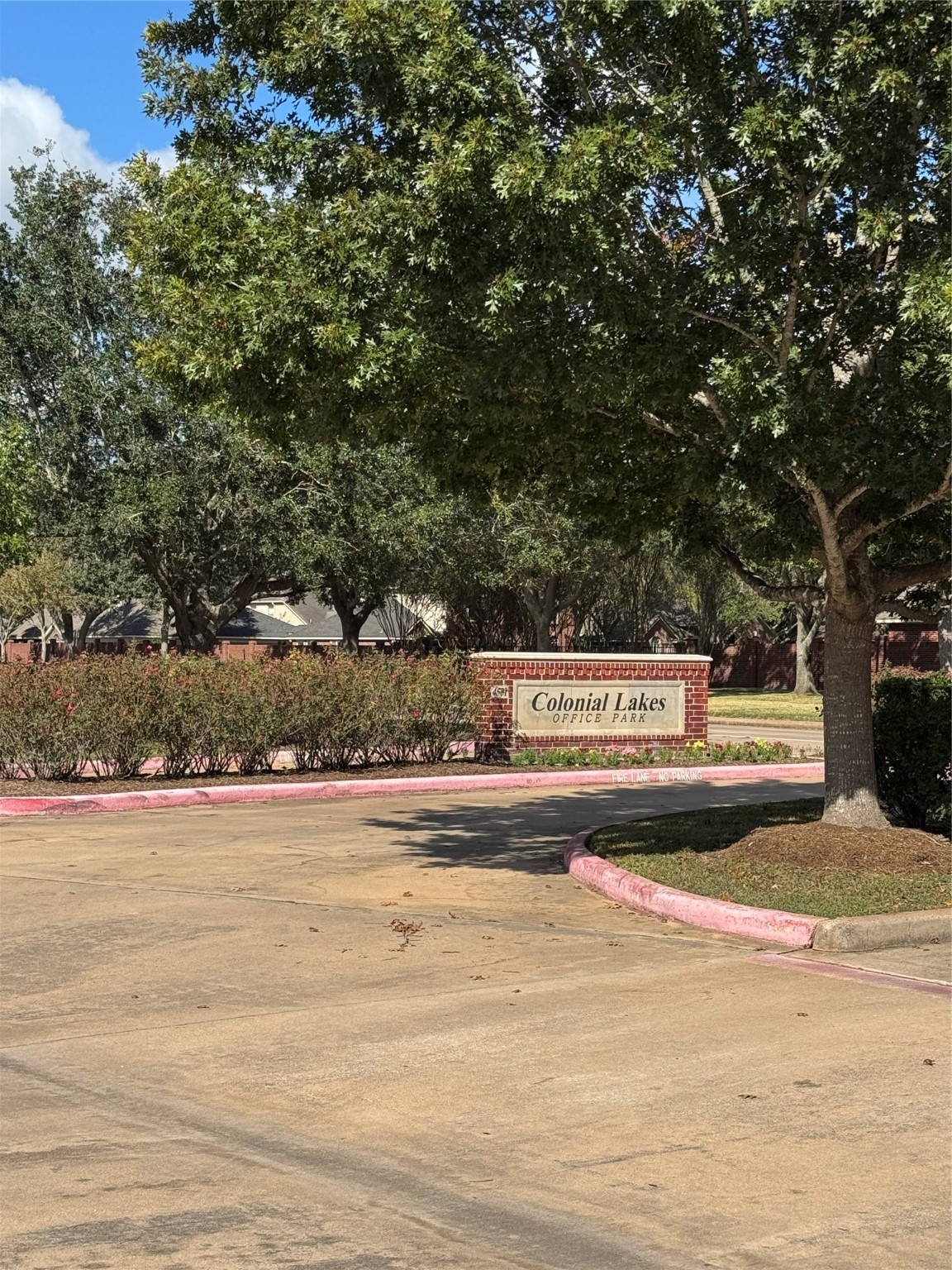 4501 Cartwright Road, Unit 203 Missouri City, TX 77459 - Photo 10 of 11 a view of a street with a building