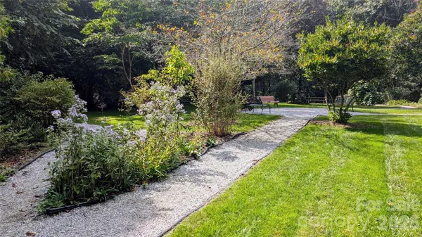 a view of backyard with green space