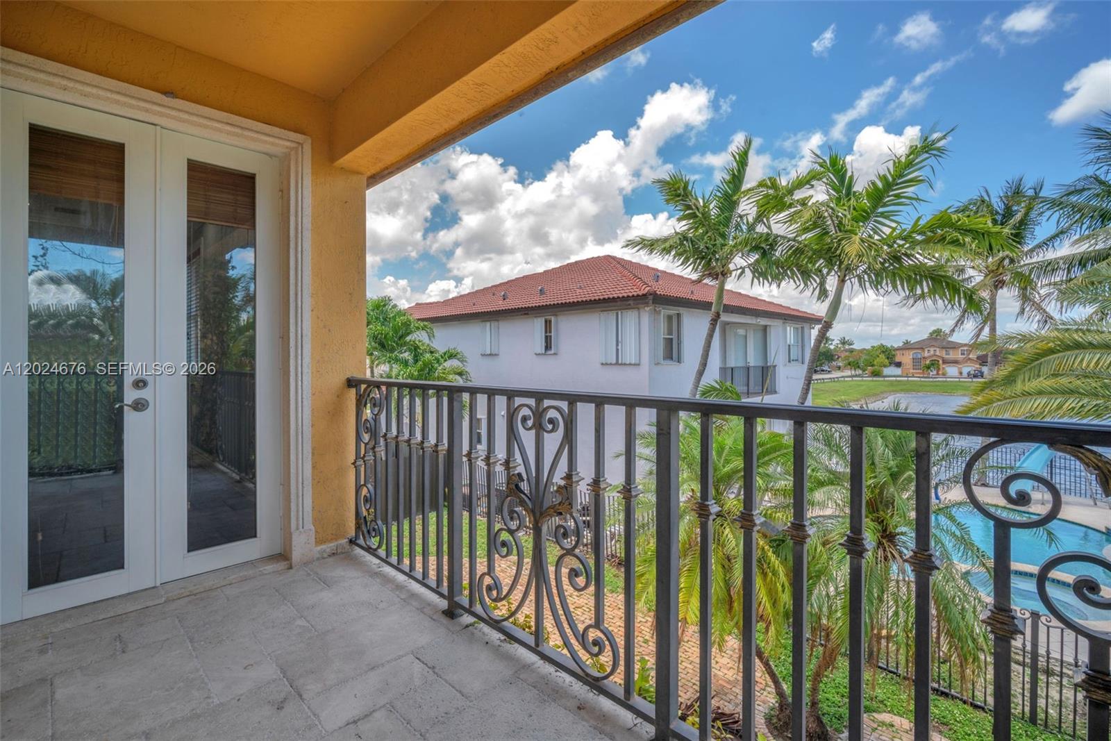 2155 Southwest 156th Court Miami, FL 33185 - Photo 44 of 57 a view of a two chairs in the balcony