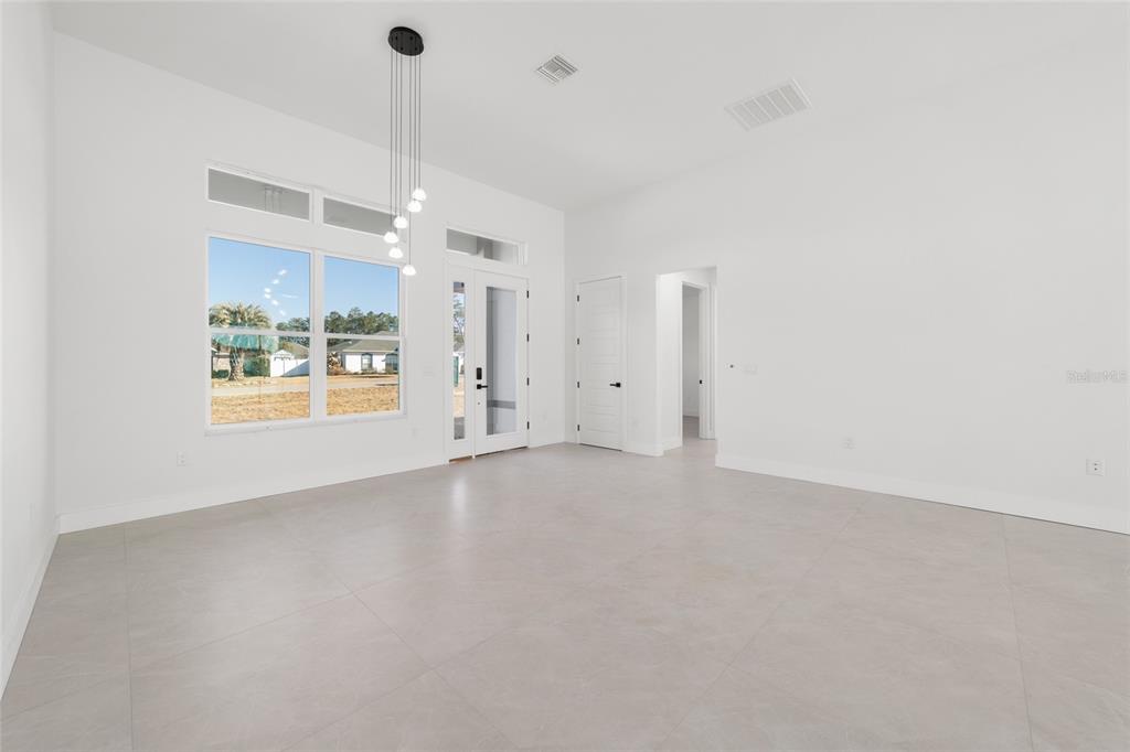 9580 Southwest 44th Avenue Ocala, FL 34476 - Photo 13 of 55 a view of an empty room with a window