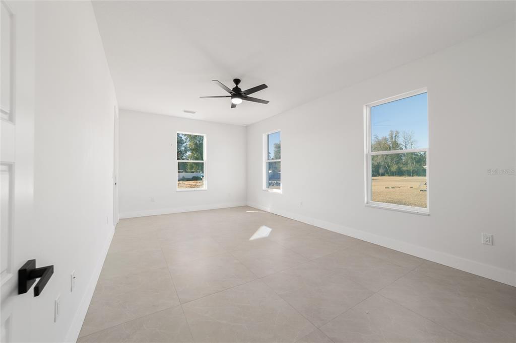 9580 Southwest 44th Avenue Ocala, FL 34476 - Photo 29 of 55 a view of an empty room with a window