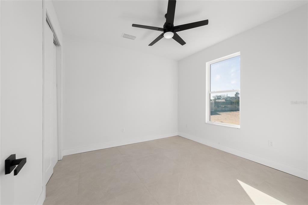 9580 Southwest 44th Avenue Ocala, FL 34476 - Photo 38 of 55 an empty room with a window