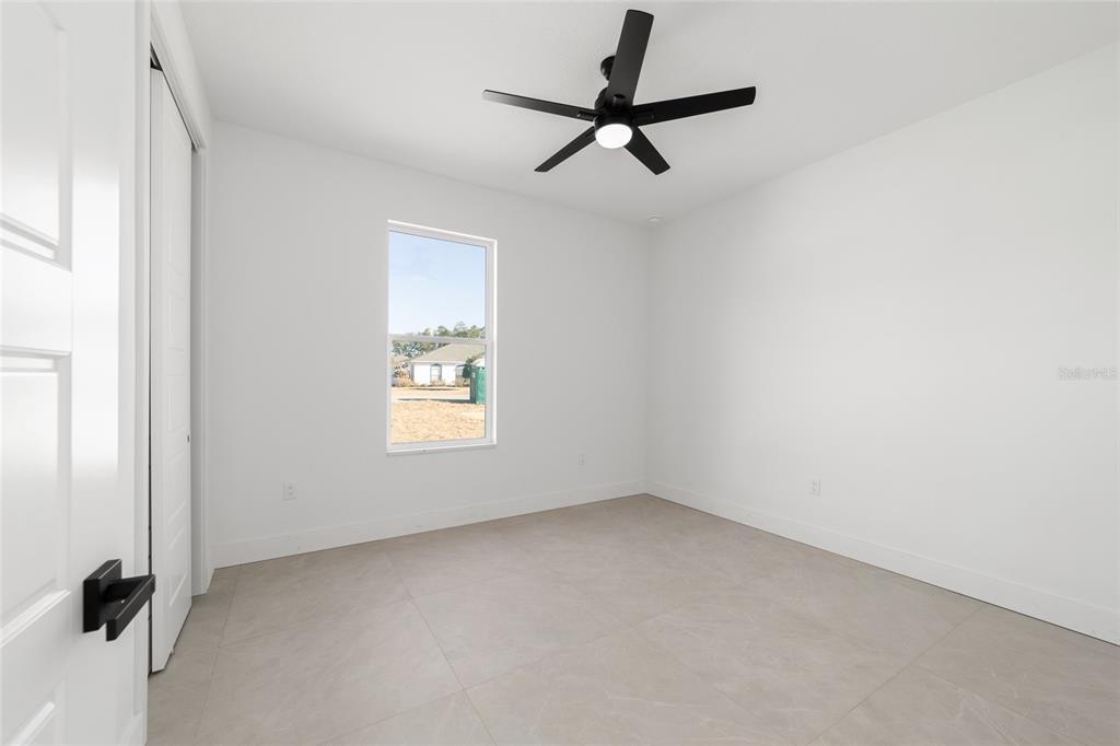 9580 Southwest 44th Avenue Ocala, FL 34476 - Photo 42 of 55 an empty room with a window