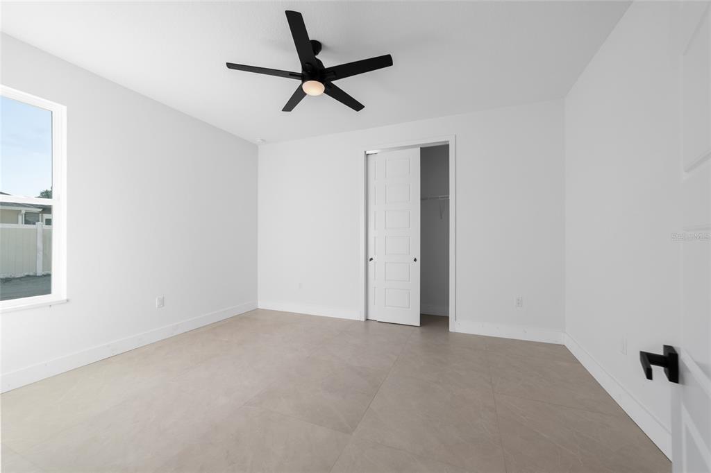 9580 Southwest 44th Avenue Ocala, FL 34476 - Photo 45 of 55 a view of a livingroom with a ceiling fan and window