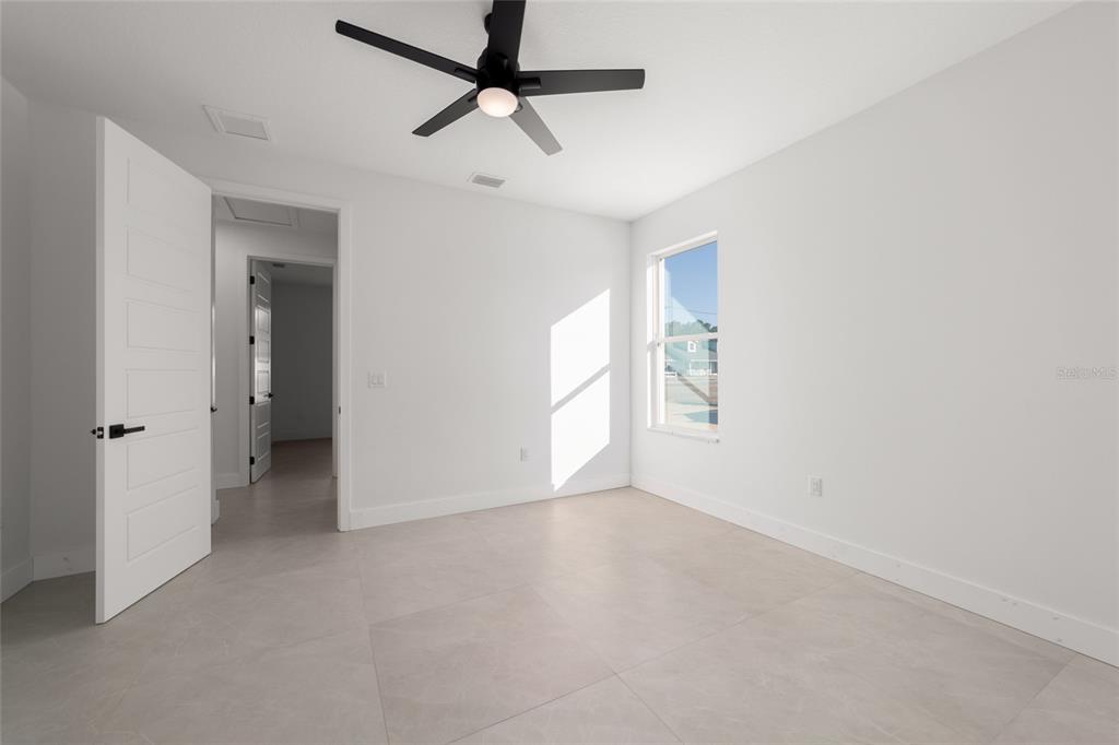 9580 Southwest 44th Avenue Ocala, FL 34476 - Photo 46 of 55 a view of an empty room with a window