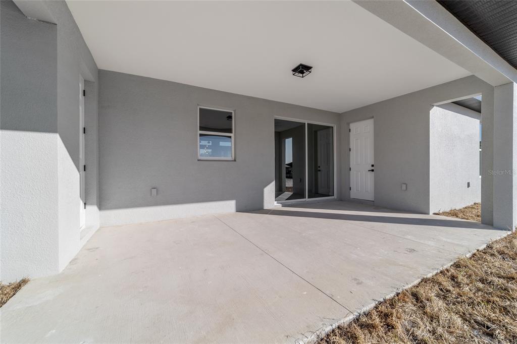 9580 Southwest 44th Avenue Ocala, FL 34476 - Photo 52 of 55 a view of an empty room with wooden floor and a window