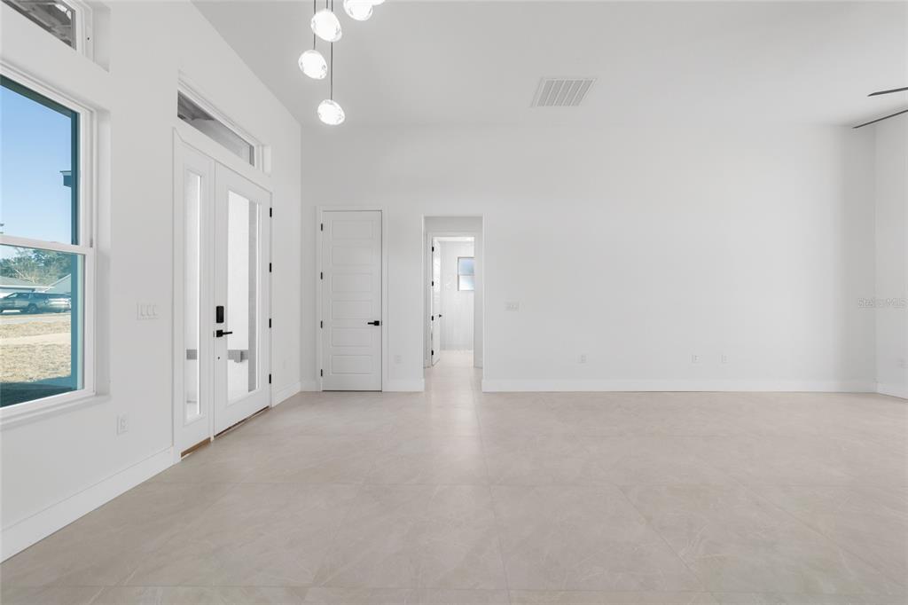 9580 Southwest 44th Avenue Ocala, FL 34476 - Photo 9 of 55 a view of an empty room with a window