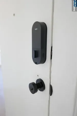 a close view of a utility room with dryer and washer