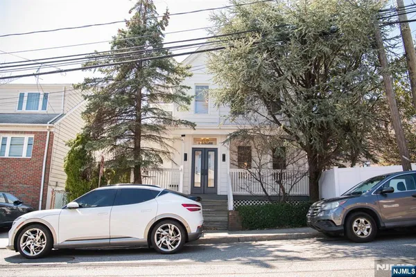 a car parked in front of a house